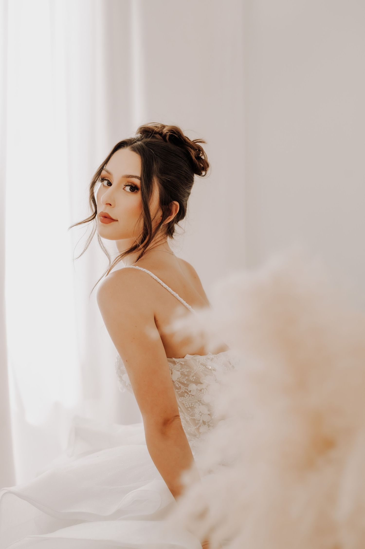 Bride portrait editorial feathers