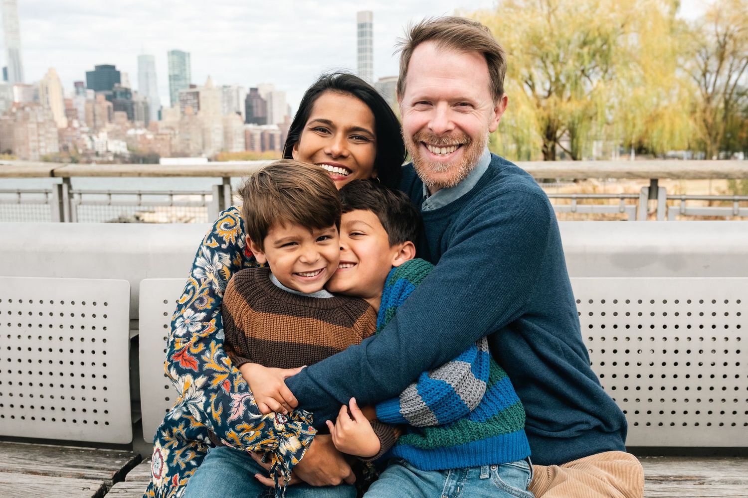 Candid family moments captured against New York City's urban backdrop.