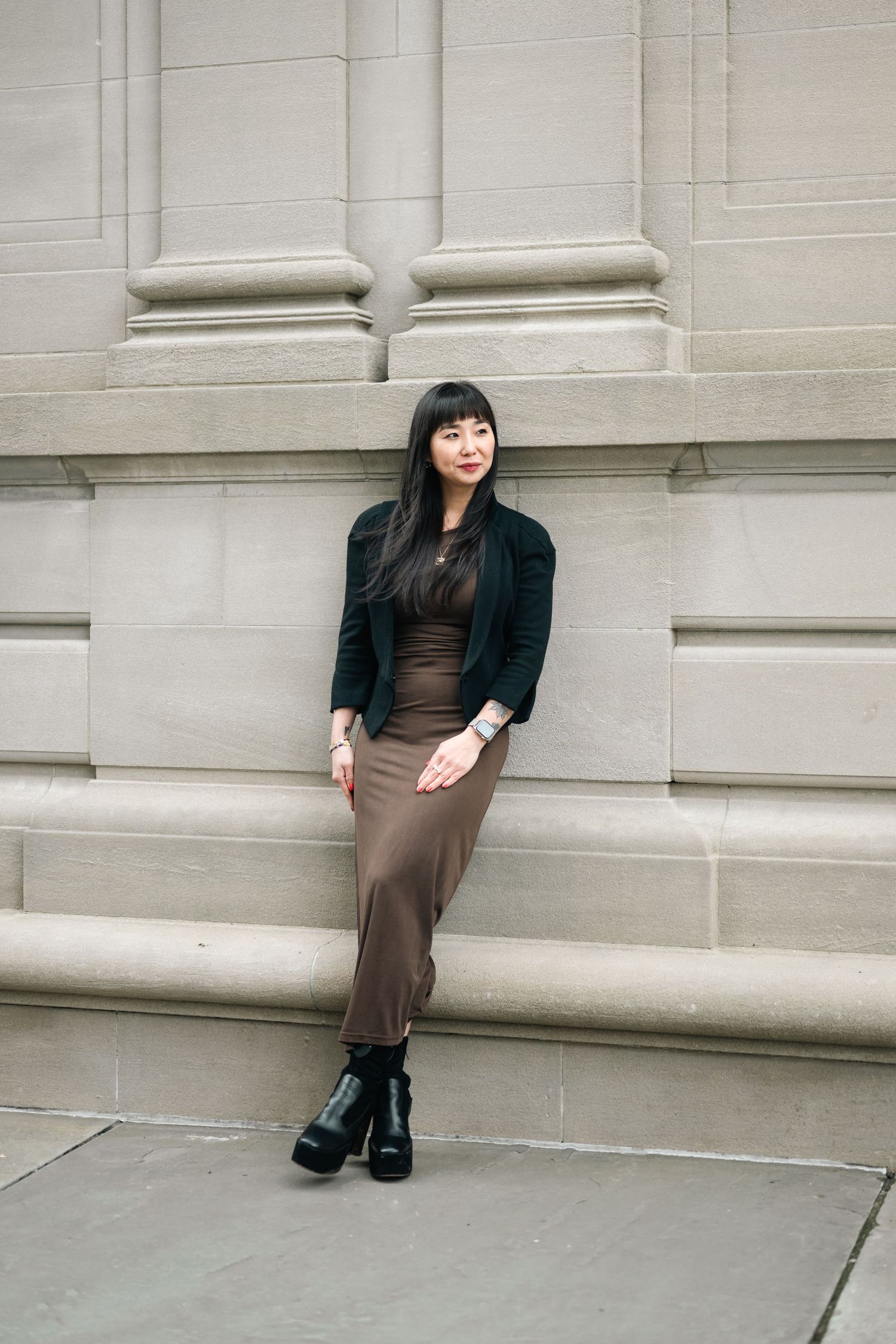 Classic architectural backdrop with white stone columns and steps.