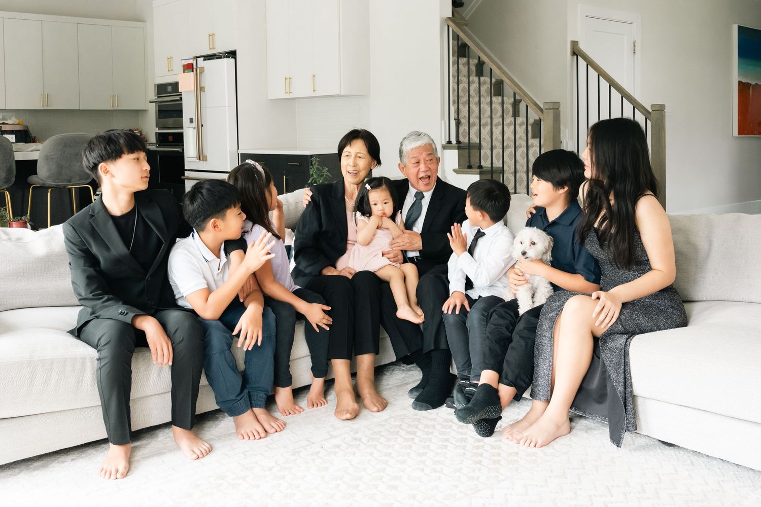 Multiple frames of people gathered on white couch showing playful interactions.