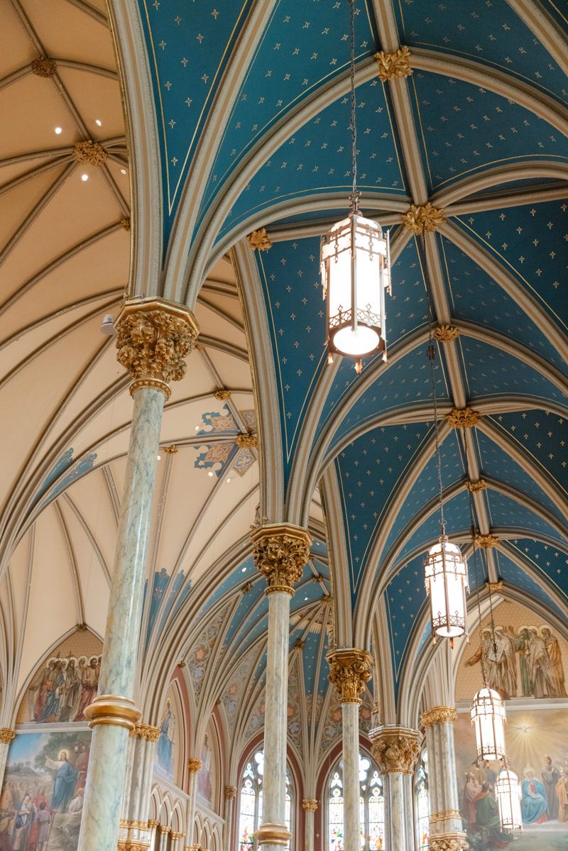 Documentary-style wedding photography at St. John’s Basilica Cathedral in Savannah’s historic district.