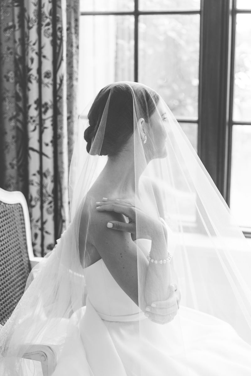 Elegant, documentary-style bridal portraits at Frederica Boathouse and Clubhouse on St. Simons Island.