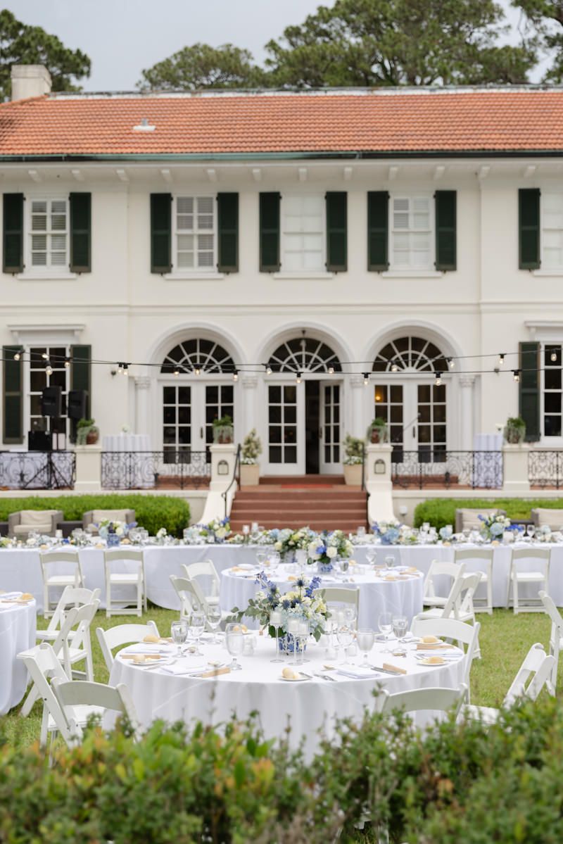 Outdoor wedding reception at Cherokee Cottage, Jekyll Island Club Resort. Documentary-style photography.
