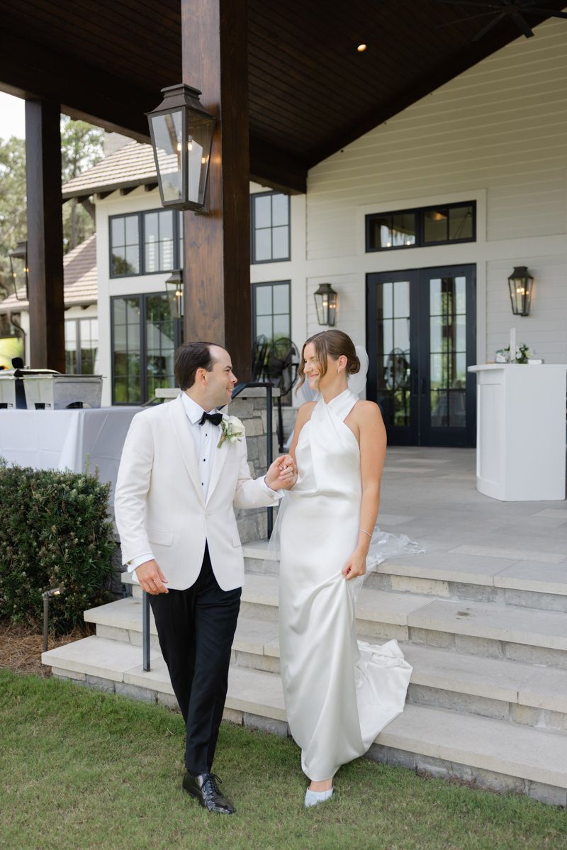 Bride and groom at elegant St Simons wedding, Forbes Farm Wesley ceremony with timeless coastal charm.