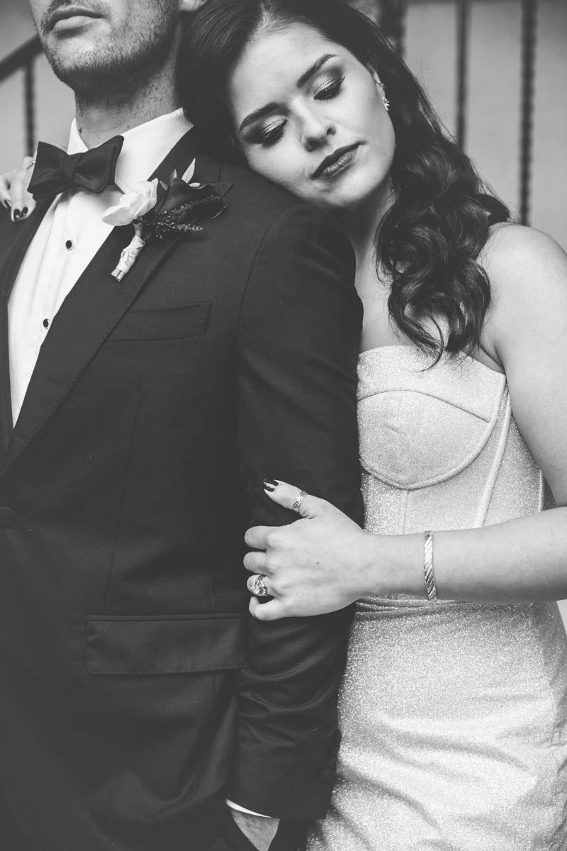 Romantic black-and-white photo of bride and groom at a luxury Jekyll Island Club wedding, captured by Georgia photographer.