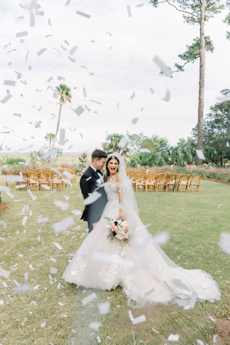 Confetti pop wedding photo, candid St. Simons and Sea Island celebration captured with fun, modern photography style.