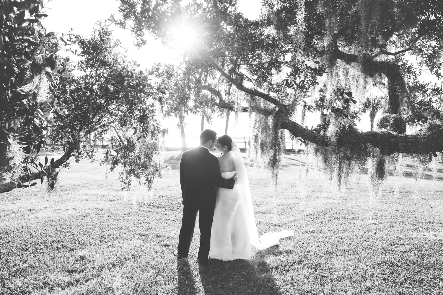 Candid documentary-style black and white wedding photography on Jekyll Island, Georgia—authentic storytelling with timeless elegance.