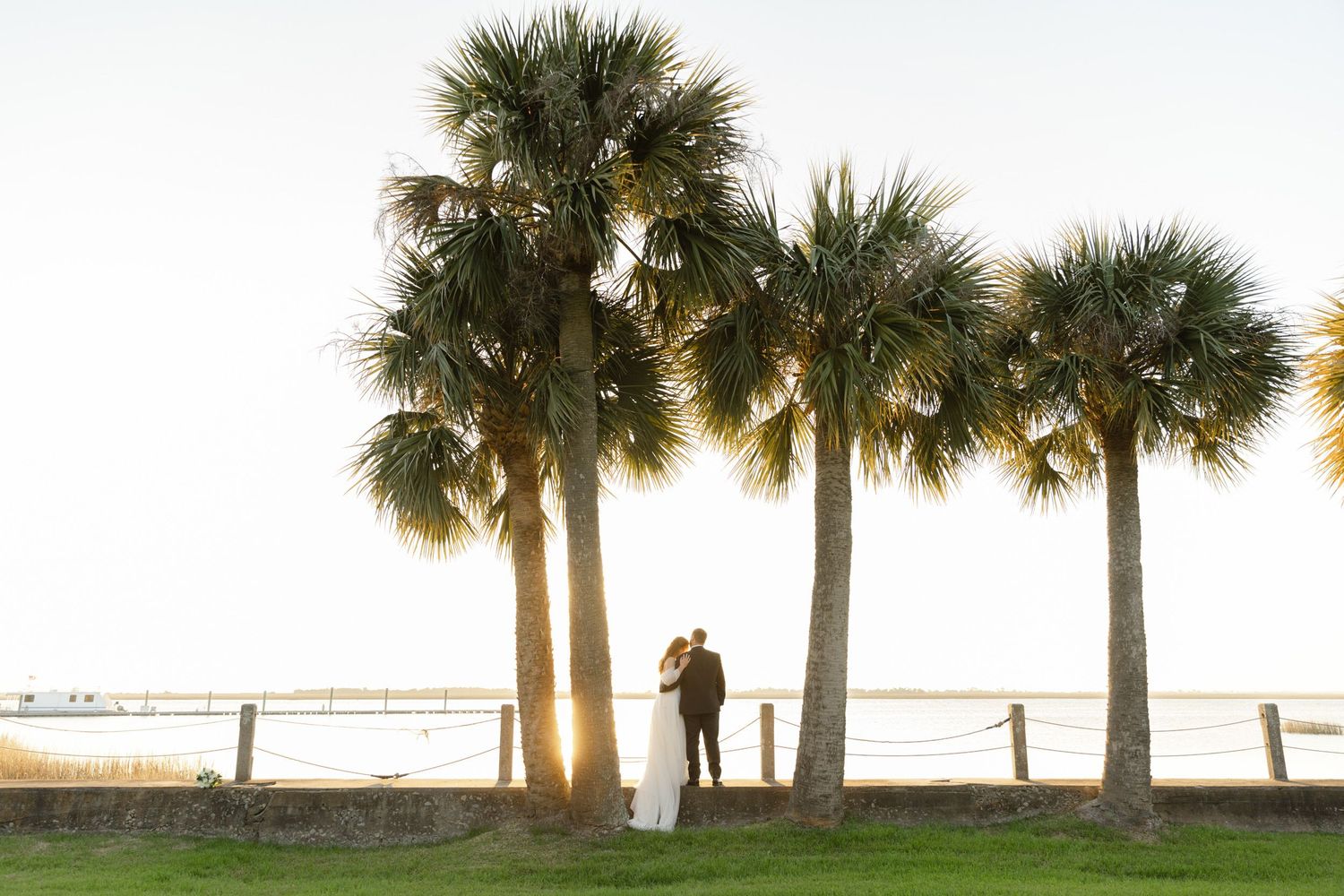 Destination wedding in Coastal Georgia with Southern charm, romantic ceremony on the Jekyll Island Club Riverfront Lawn.
