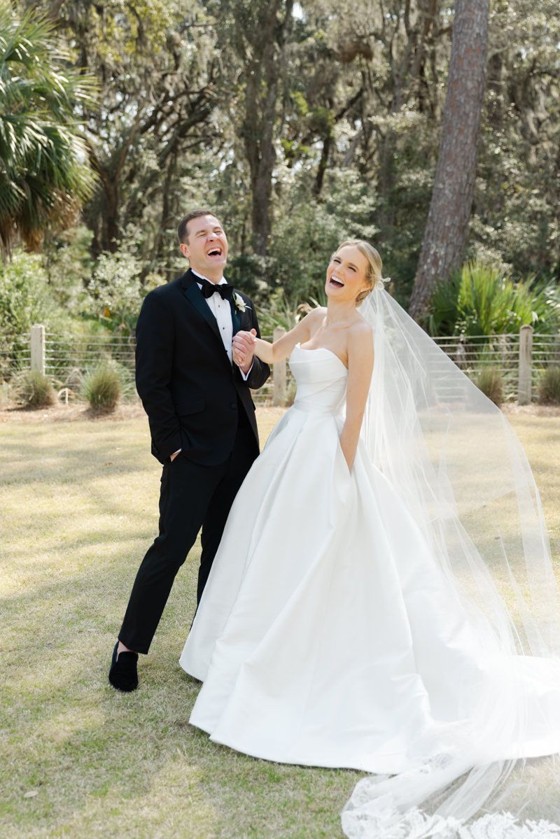 Groom laughing candidly at Forbes Farm wedding, St. Simons Island photo inspo with authentic, film-inspired style.