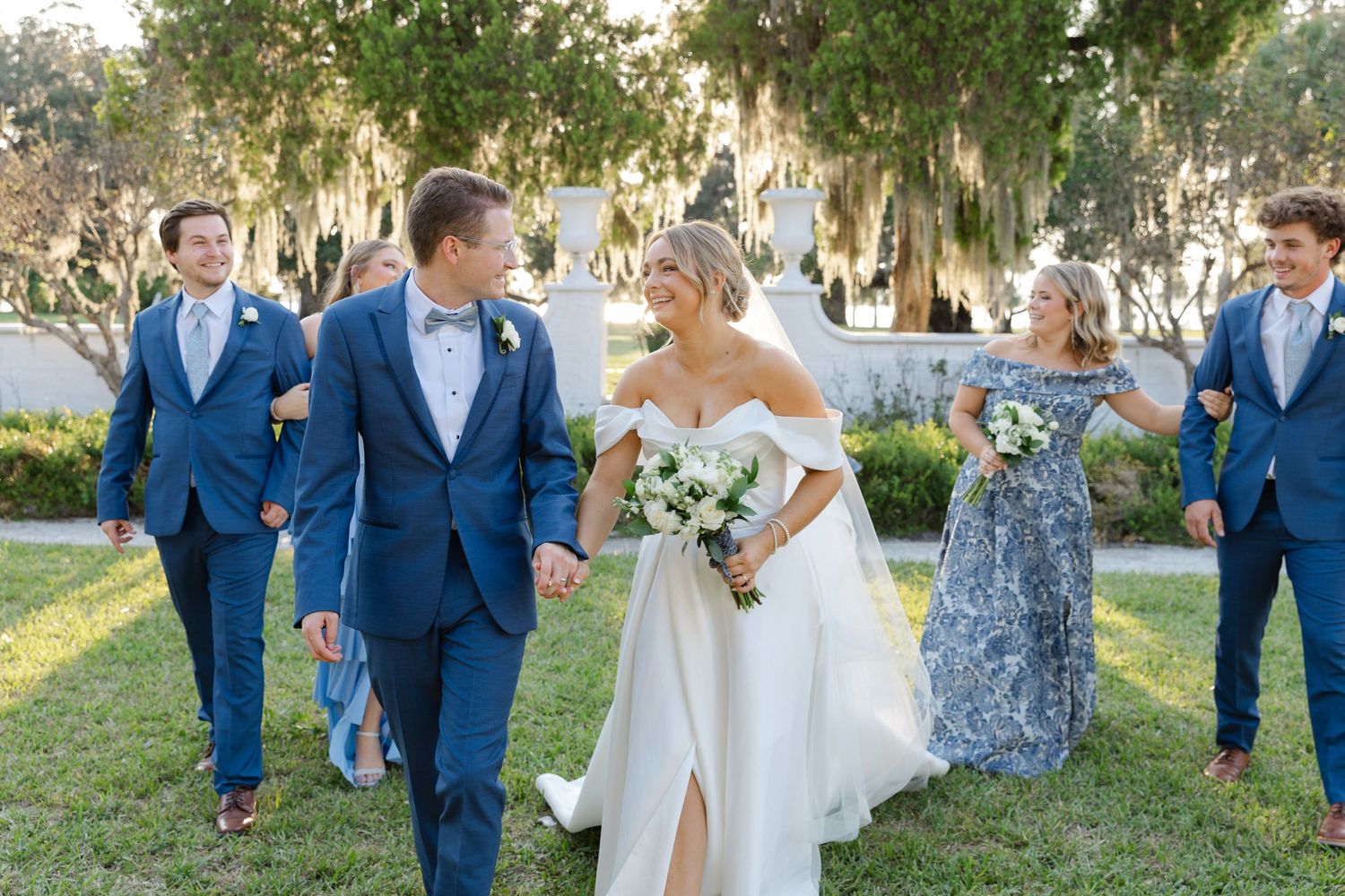 Wedding party in the garden at Jekyll Island Club Resort hotel, Southern ceremony with timeless charm and elegant coastal backdrop.