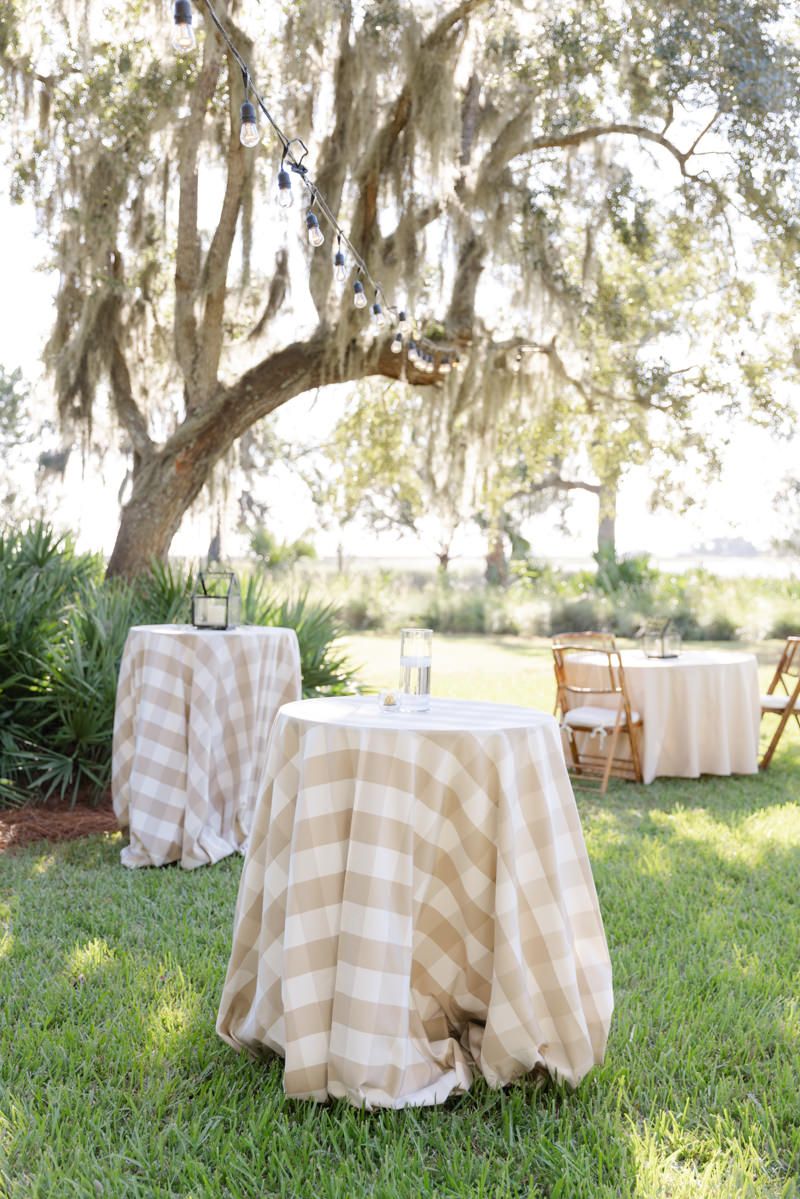 Marsh-side wedding venue at Captain’s Bluff, St. Simons Island. Reception details from a Sea Island area wedding.