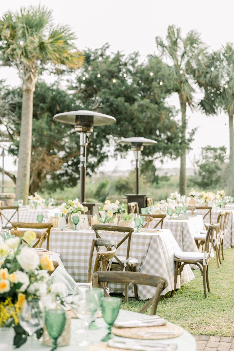 Rehearsal dinner at Rainbow Island, Sea Island resort. Marshside views and luxury, documentary-style wedding photography.