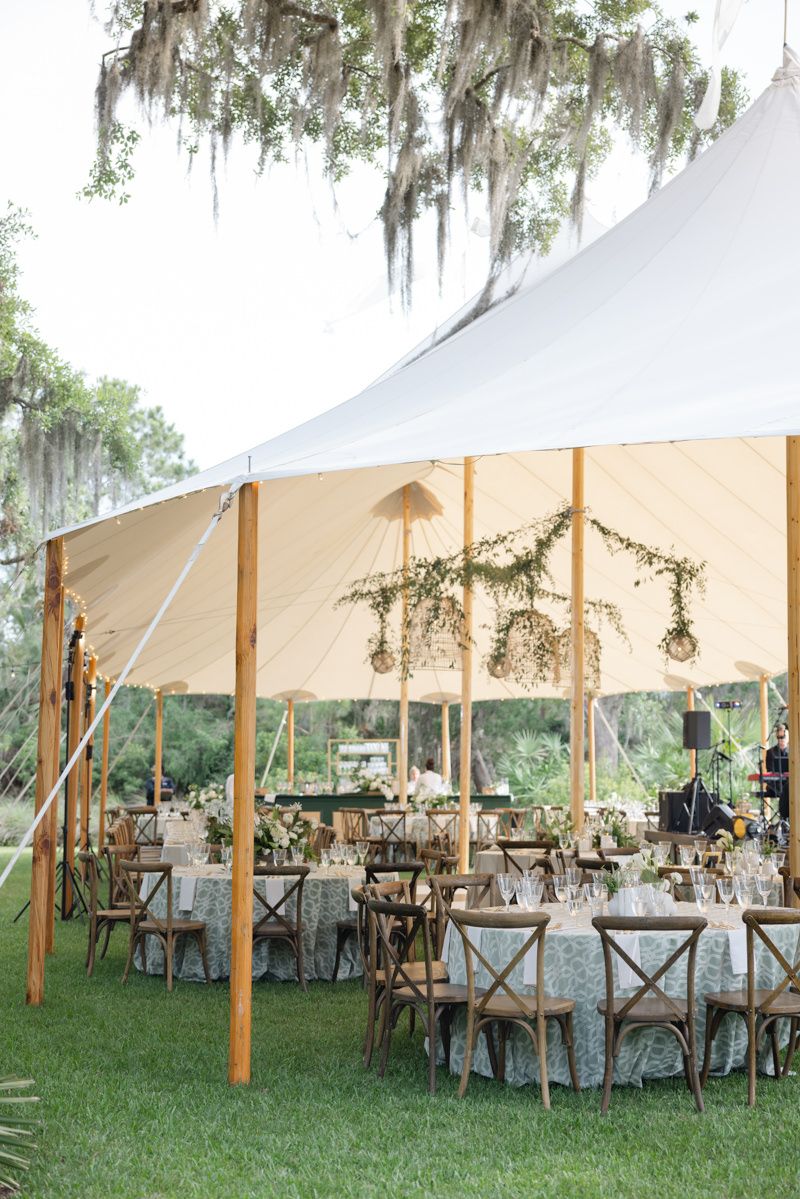 Sail tent wedding reception with luxury details on St. Simons, Jekyll, or Sea Island. Elegant coastal celebration.