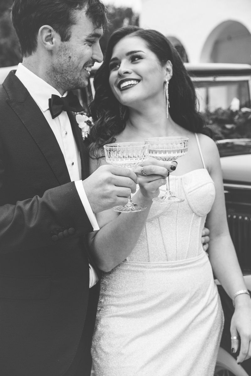 Candid shot of groom cheering at Jekyll Island wedding, authentic photography inspo with fun, modern aesthetic.