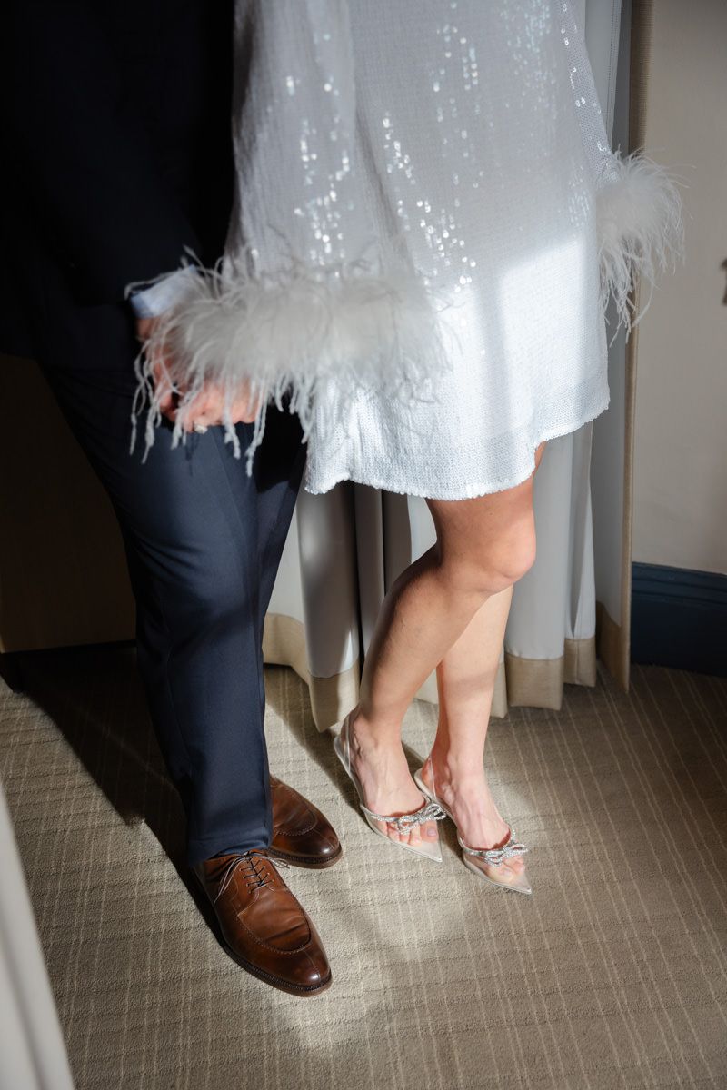 Editorial-style photo of bride and groom at their rehearsal dinner at Cherokee Cottage on Jekyll Island, captured by wedding photographer.