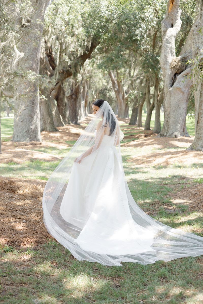 Sea Island wedding couple photos, modern candid photography capturing chic, fashion-forward vibes at luxury Georgia venue.