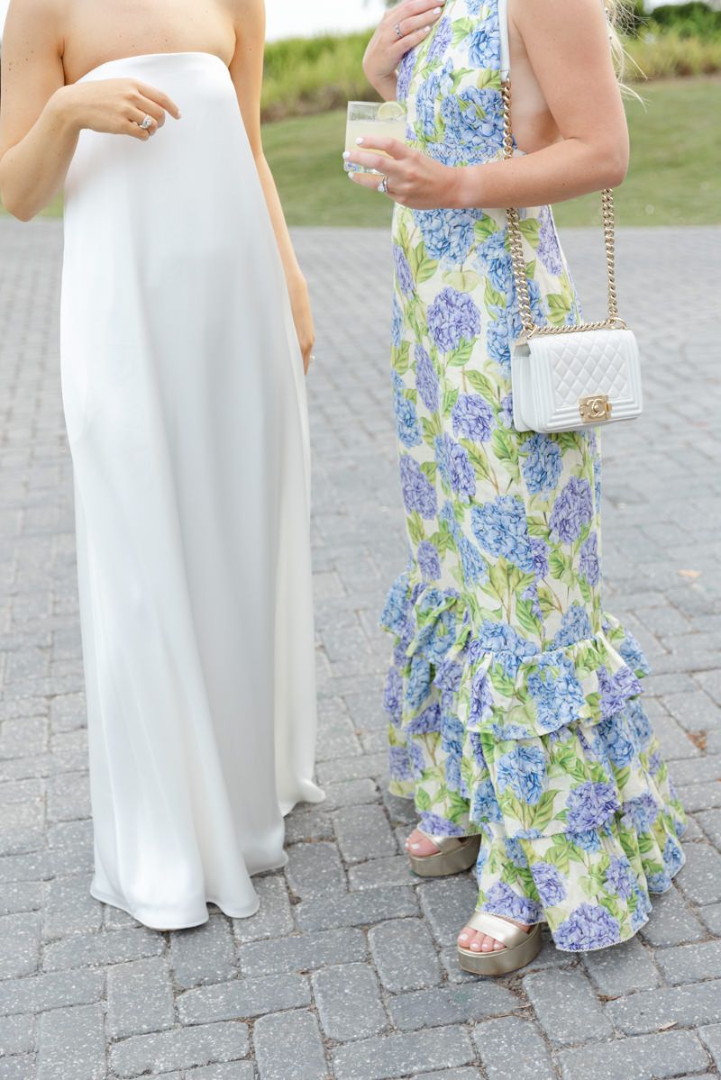 Bride’s rehearsal dinner dress with coastal vibes at Sea Island, Georgia. Elegant pre-wedding style.