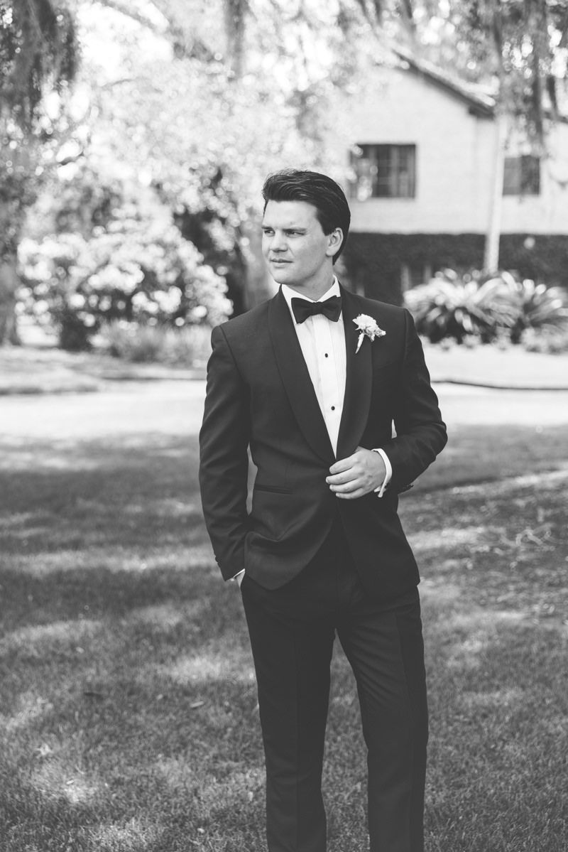 Portrait of groom in his tuxedo at Frederica Golf Club, St. Simons Island. Luxury wedding photography.