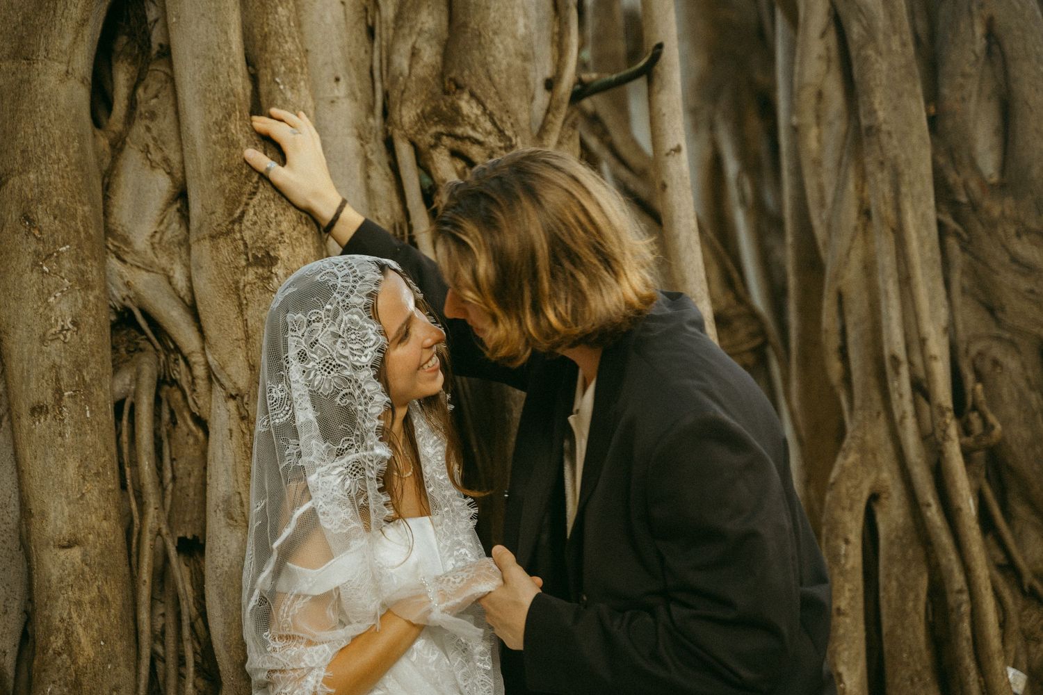 Wedding preparation scene with elegant decor and flowing veils.