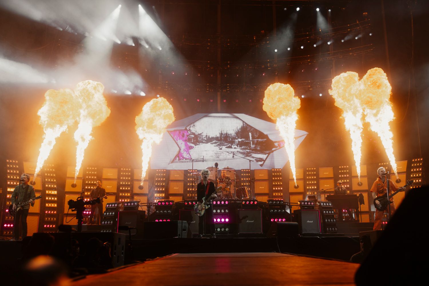 Green Day performing live in Melbourne with pyrotechnics. Professional concert photography featuring Billie Joe Armstrong and fire.