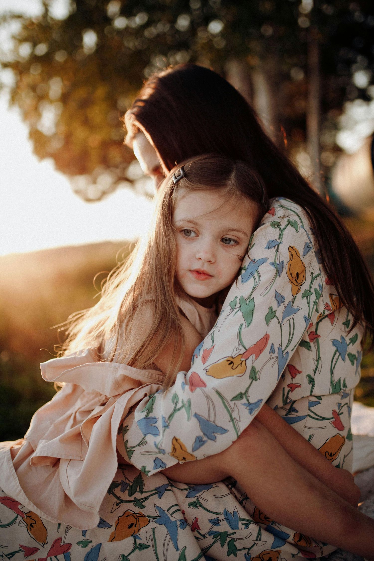 Prescott Arizona, mountaintop Family photography. A tender moment captured in warm sunlight
