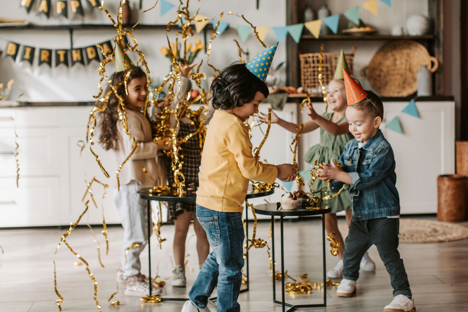 Prescott's playful birthday party, kids enjoying cake and balloons, captured by top Arizona children photographer.