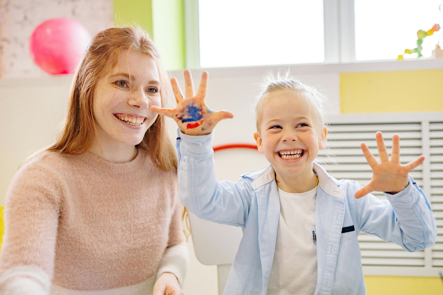 Chandler Arizona Daycare Photography Young students engaged in interactive learning activities in a bright classroom setting.