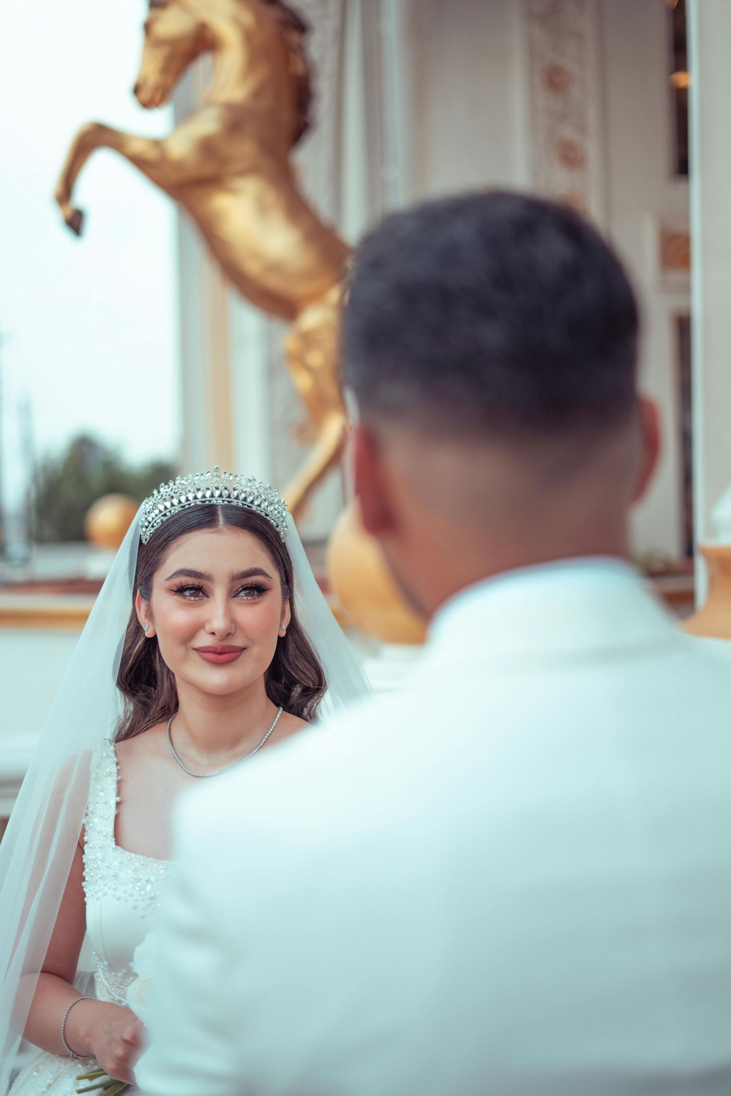 A series of romantic wedding photos showing a bride in white dress and tiara sharing tender moments. Trusted Flagstaff Photographer.