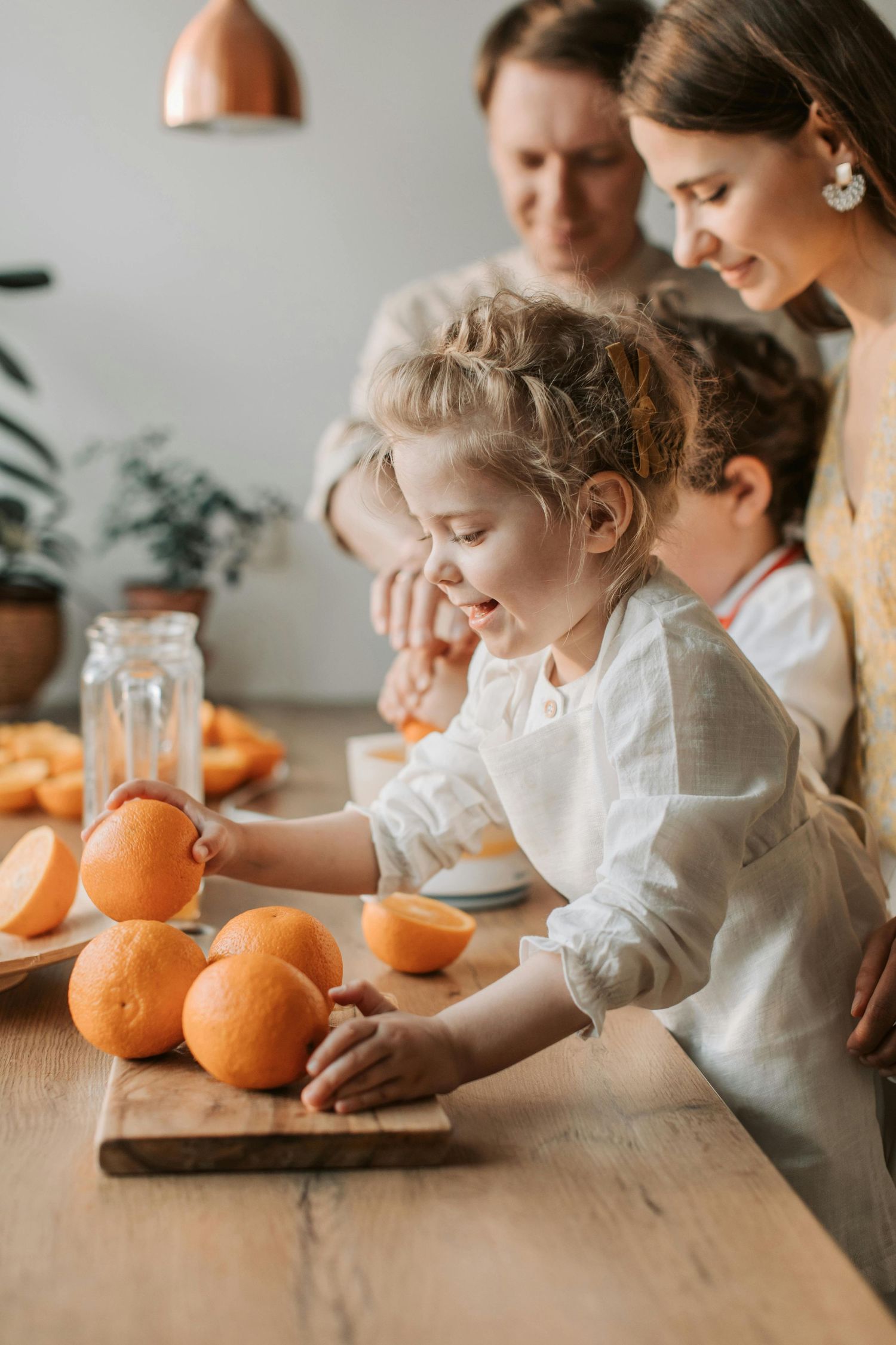 Bullhead City studio family portrait, golden warm tones, photographed by luxury Arizona family photographer.