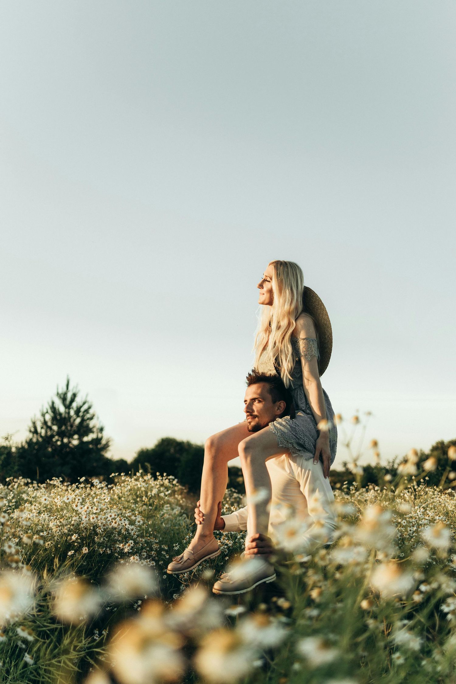 Tender moment between couple surrounded by flowers, captured with gentle, emotional Arizona storytelling style. Fountain Hills.