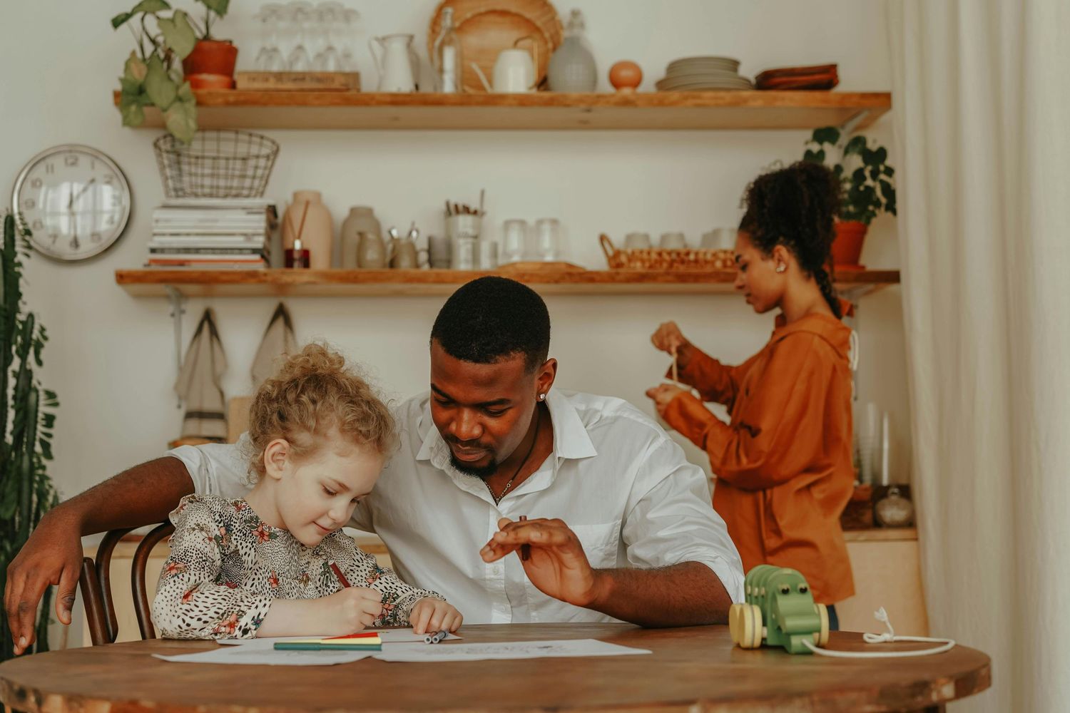 Warm and joyful home portraits, capturing parents and kids enjoying each other, photographed by Arizona family photographer.