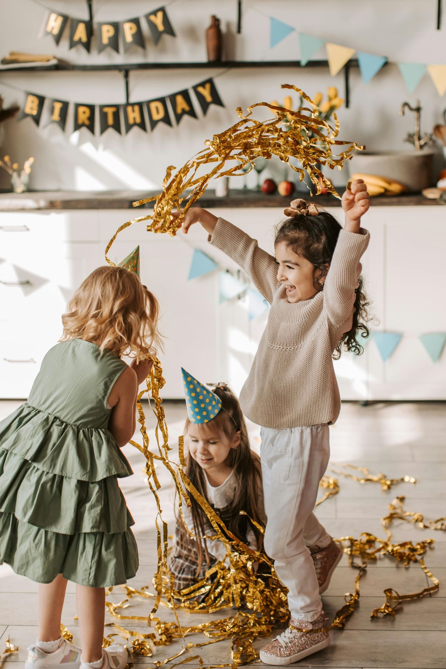 Flagstaff birthday celebration, children playing games, smiles all around, photographed by a premier Arizona children photographer.