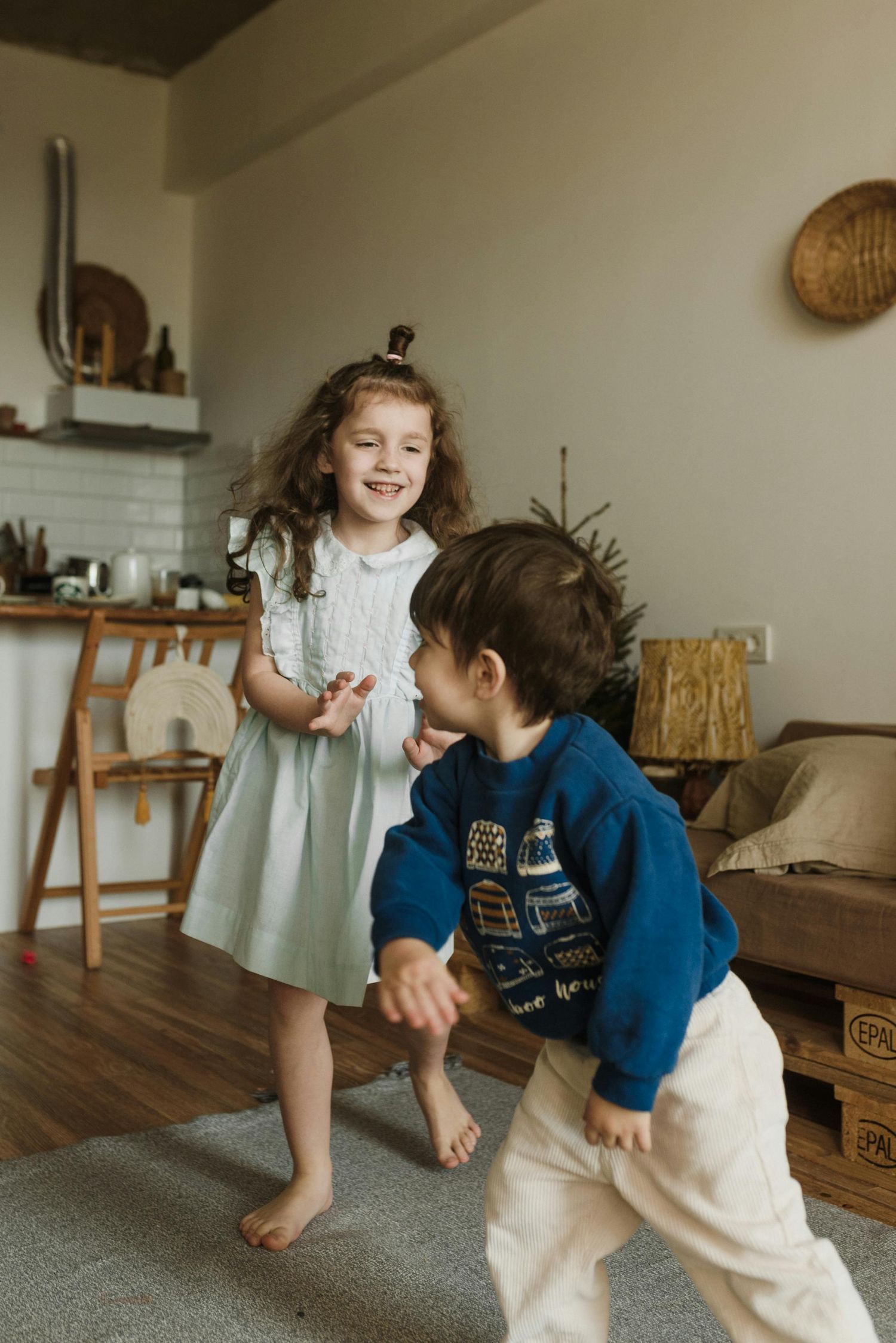 Marana, Arizona children and parents sharing warm hugs in the living room, photographed with fine art luxury.