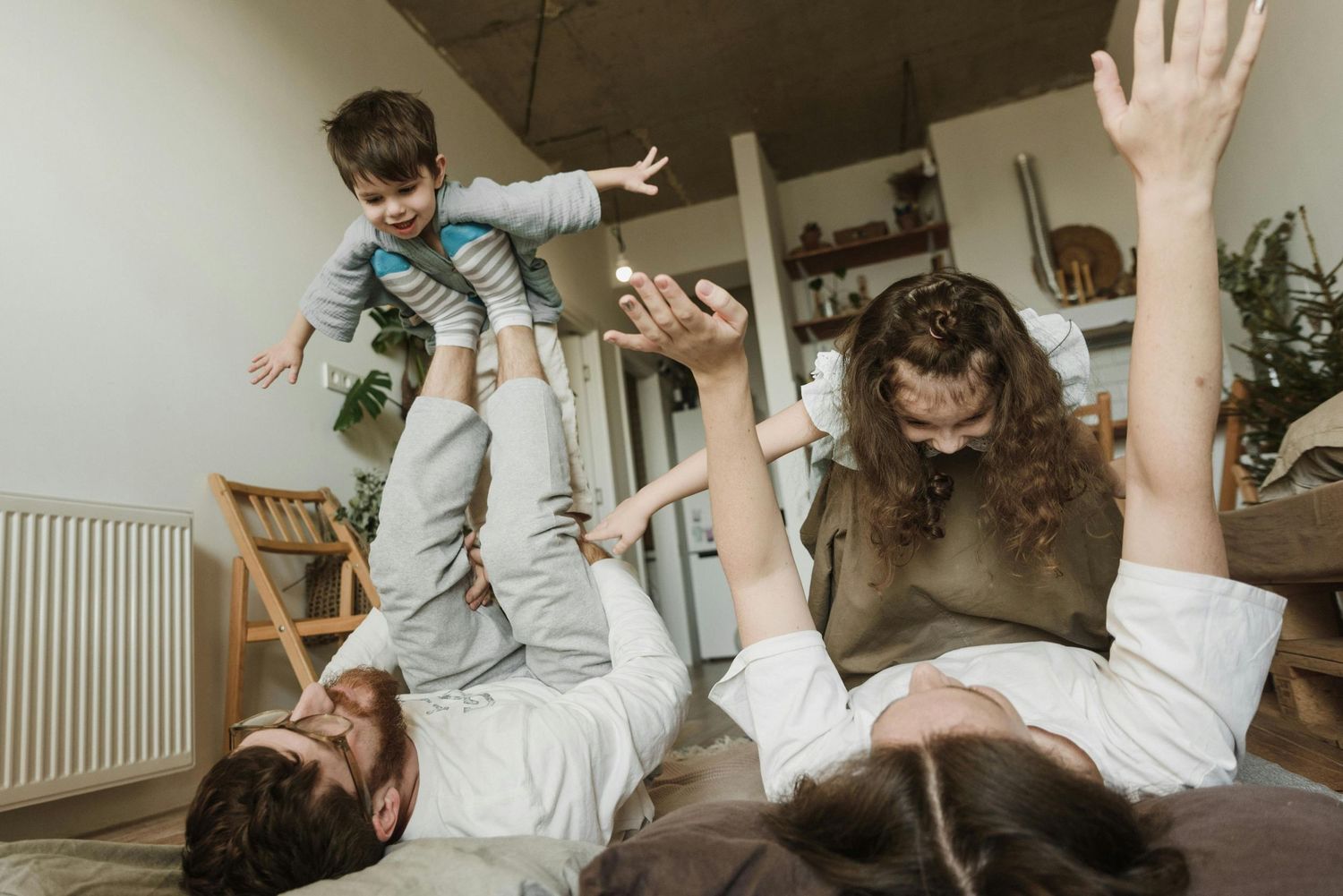 Patagonia, Arizona sunset-filled home portraits, parents and kids enjoying sweet moments, captured by an Arizona family photographer.