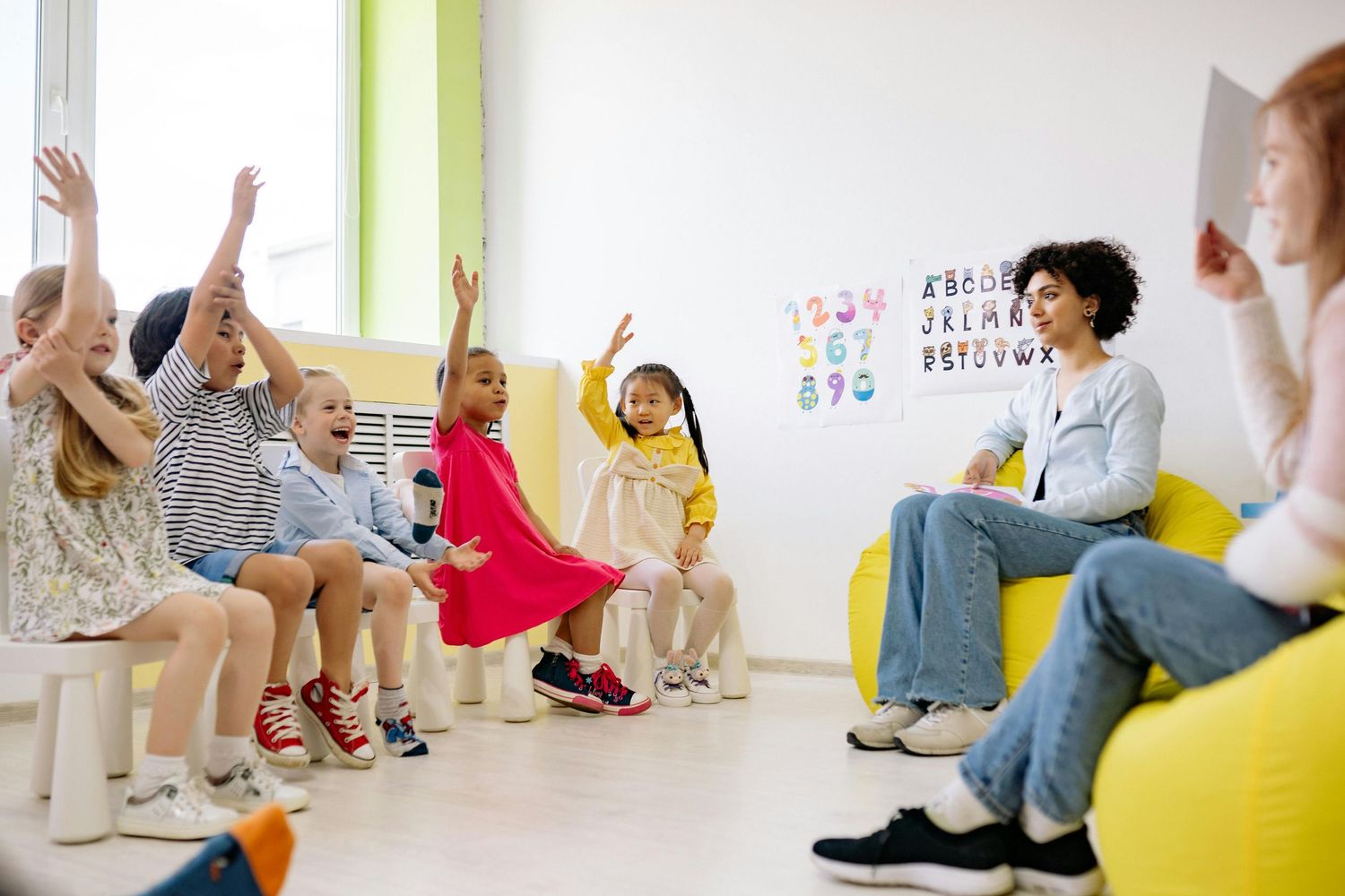 Queen Creek  Arizona Daycare Photography Children participating in interactive learning activities in a bright classroom space.