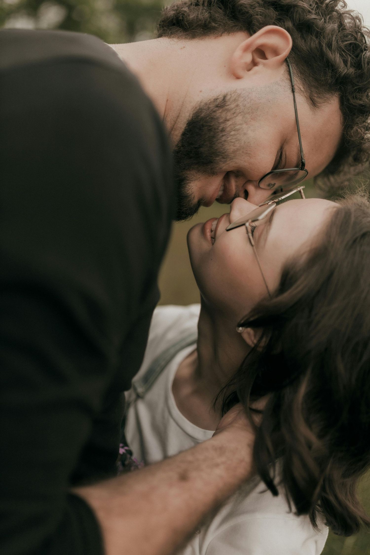 Close-up shot of a romantic kiss between two people showing intimacy and connection. Best Photographer Phoenix.