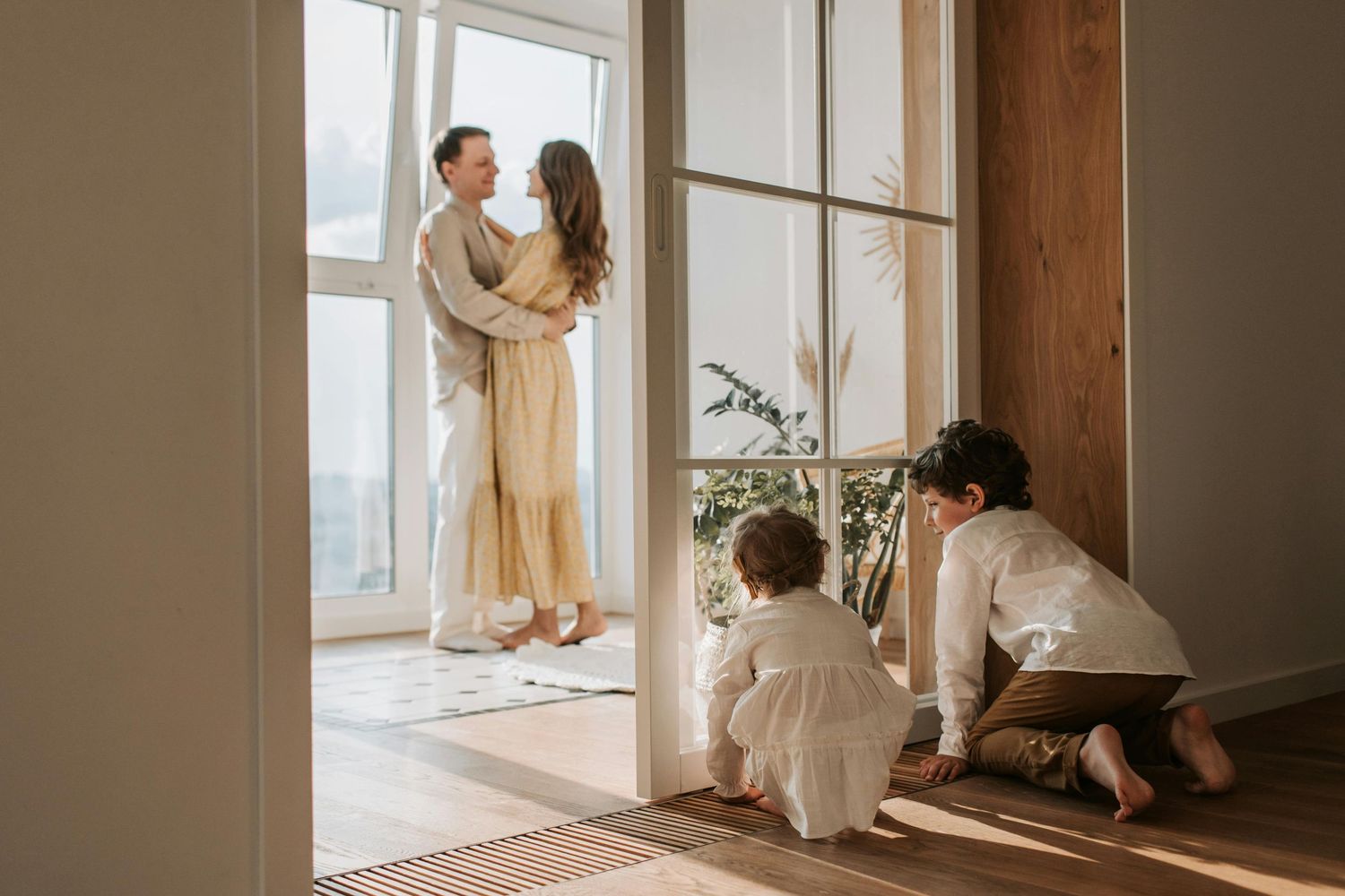 Mesa indoor family session, playful smiles, warm lighting, photographed by Arizona family photographer