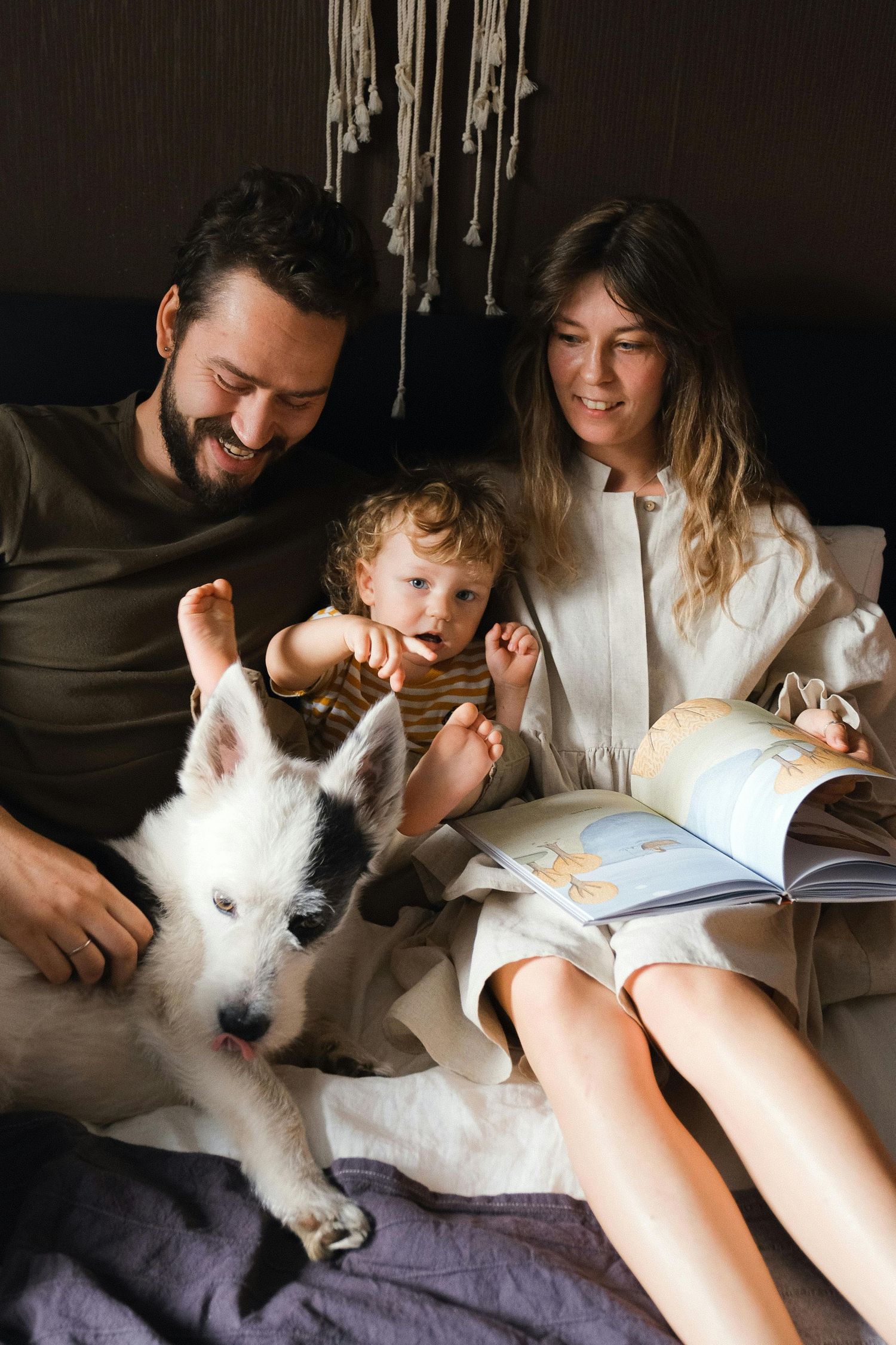 Tubac, Arizona bedtime stories, parents and children sharing laughs, photographed as timeless heirloom-quality images.