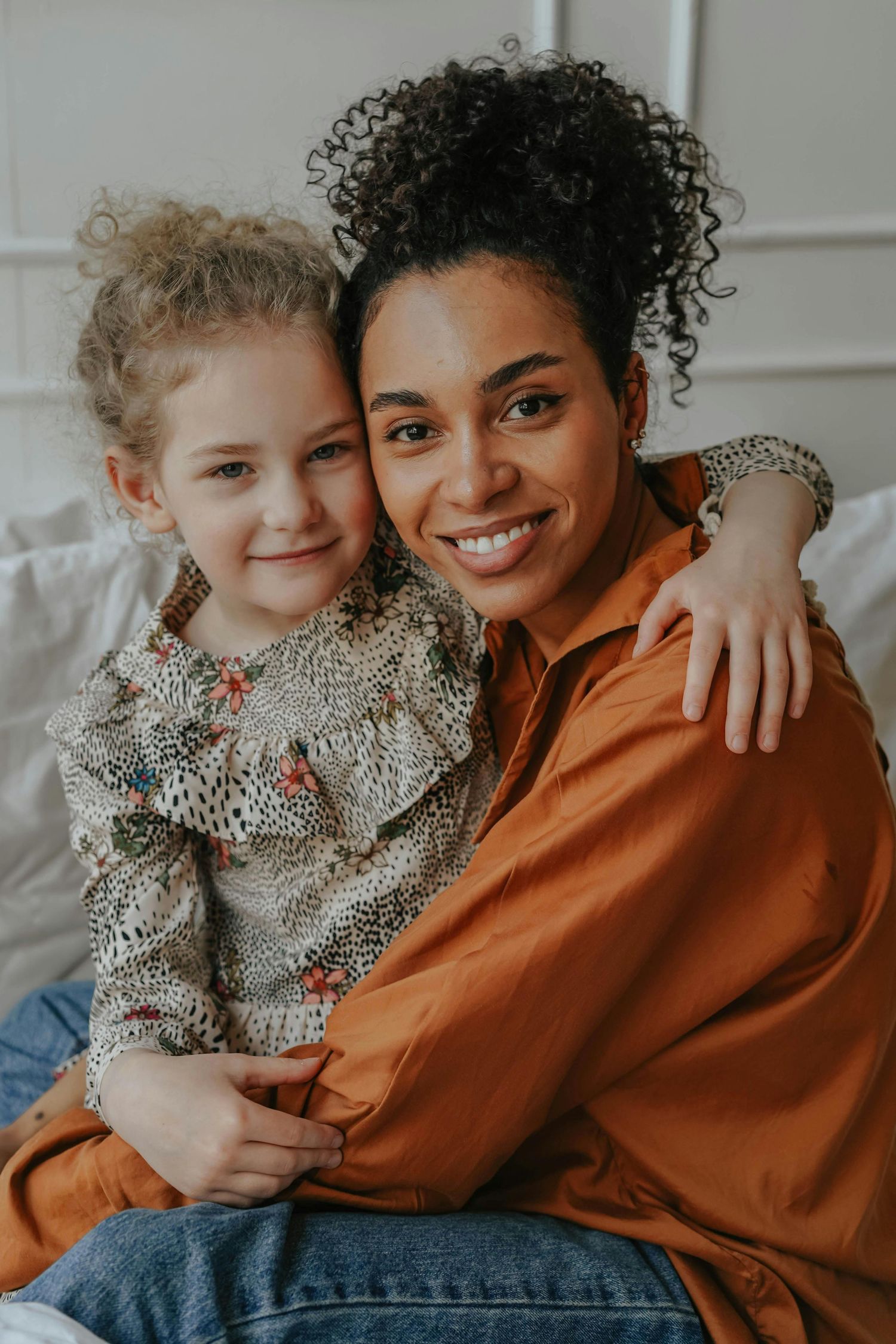 Tempe Arizona Children hugging parents during cozy home portraits, captured with timeless luxury and attention to heirloom detail.