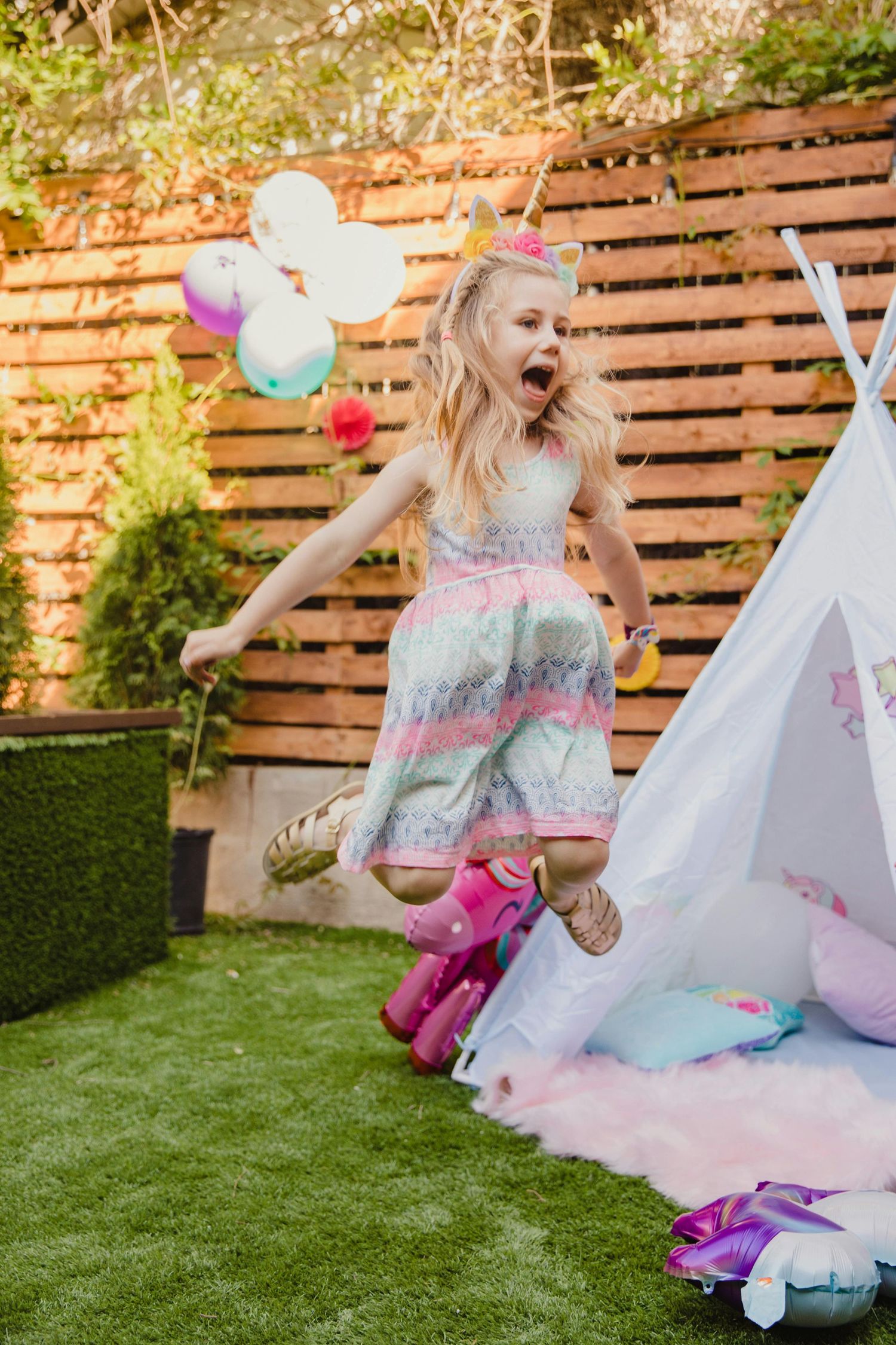 Holbrook playful birthday, kids enjoying cake and balloons, photographed by luxury Arizona children photographer.