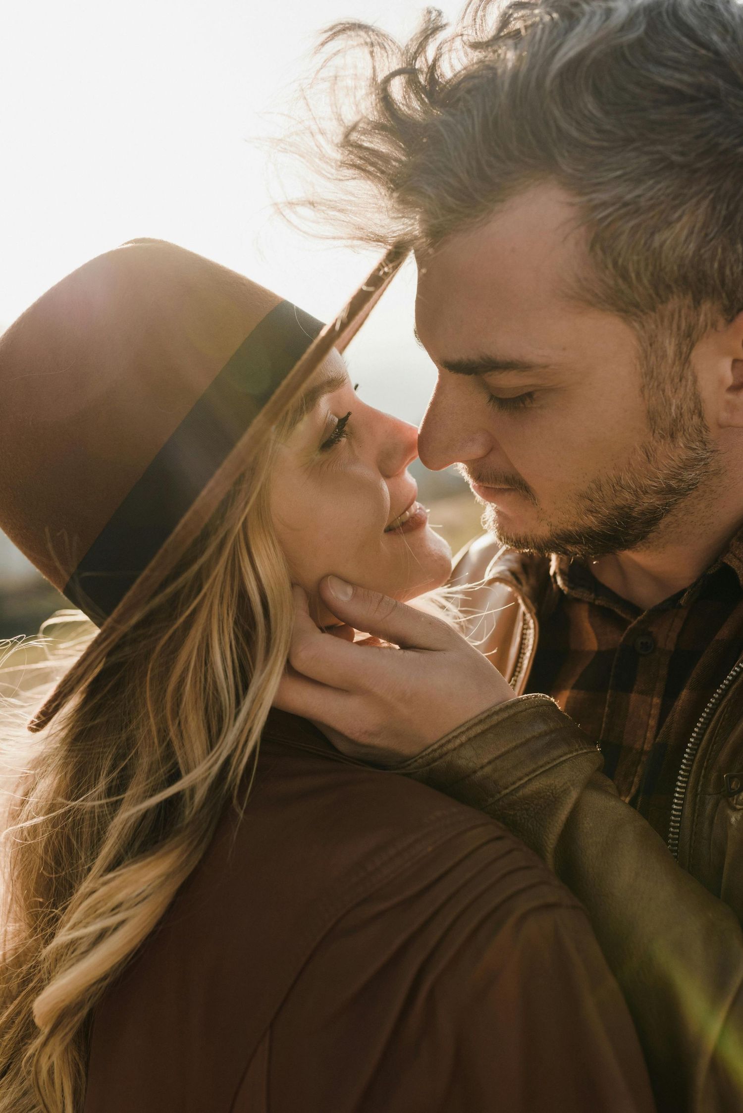 Payson mountaintop proposal, intimate couple, red-hatted woman, photographed by premier engagement photographer Arizona.