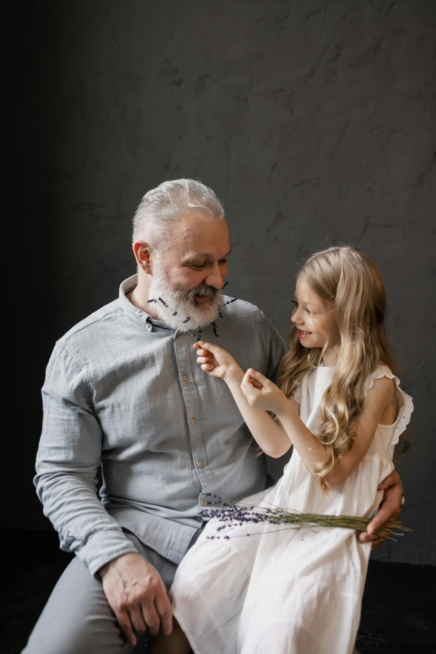 Tucson bright studio session, happy family enjoying golden tones, photographed by Arizona family photographer.