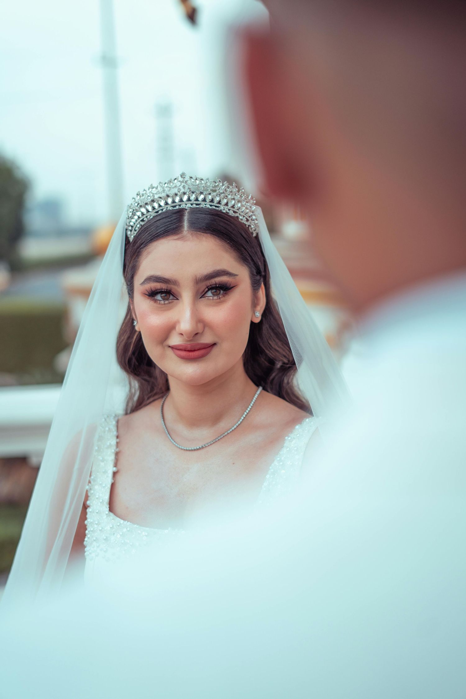 Close-up wedding portraits showing a bride wearing an elegant tiara a soft focus background.  Award Winning Photographer Tempe.