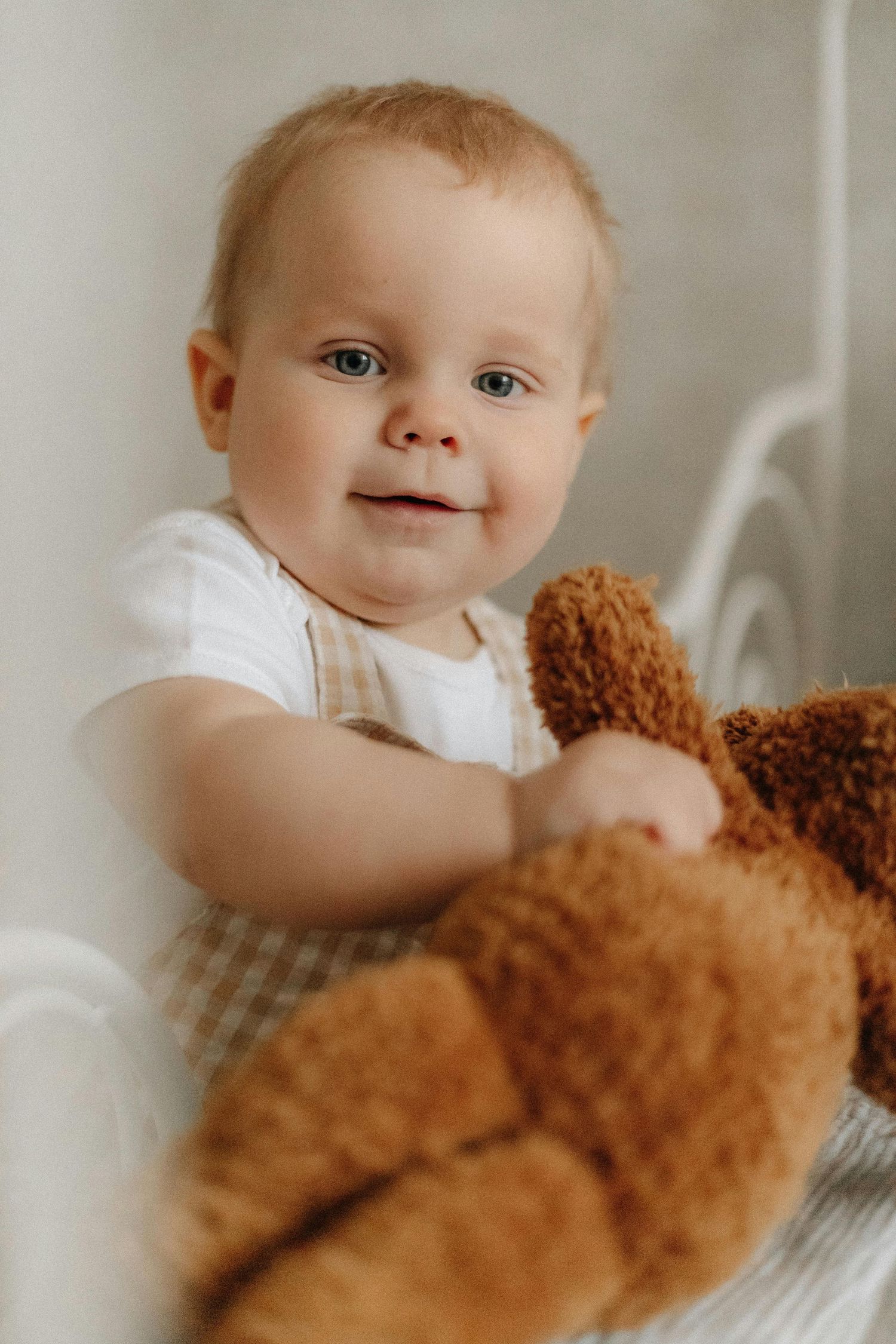 Payson parents and kids enjoying laughter-filled home portraits, photographed with fine art luxury attention.