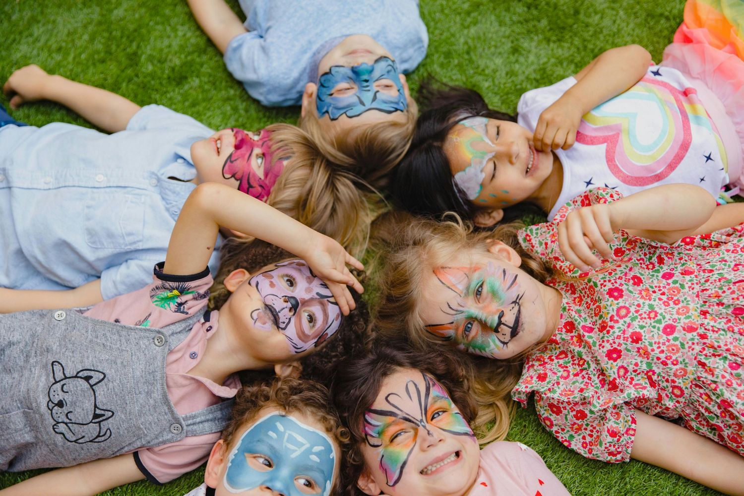 Tucson birthday celebration, children laughing, balloons and cake, captured by premier Arizona children photographer.