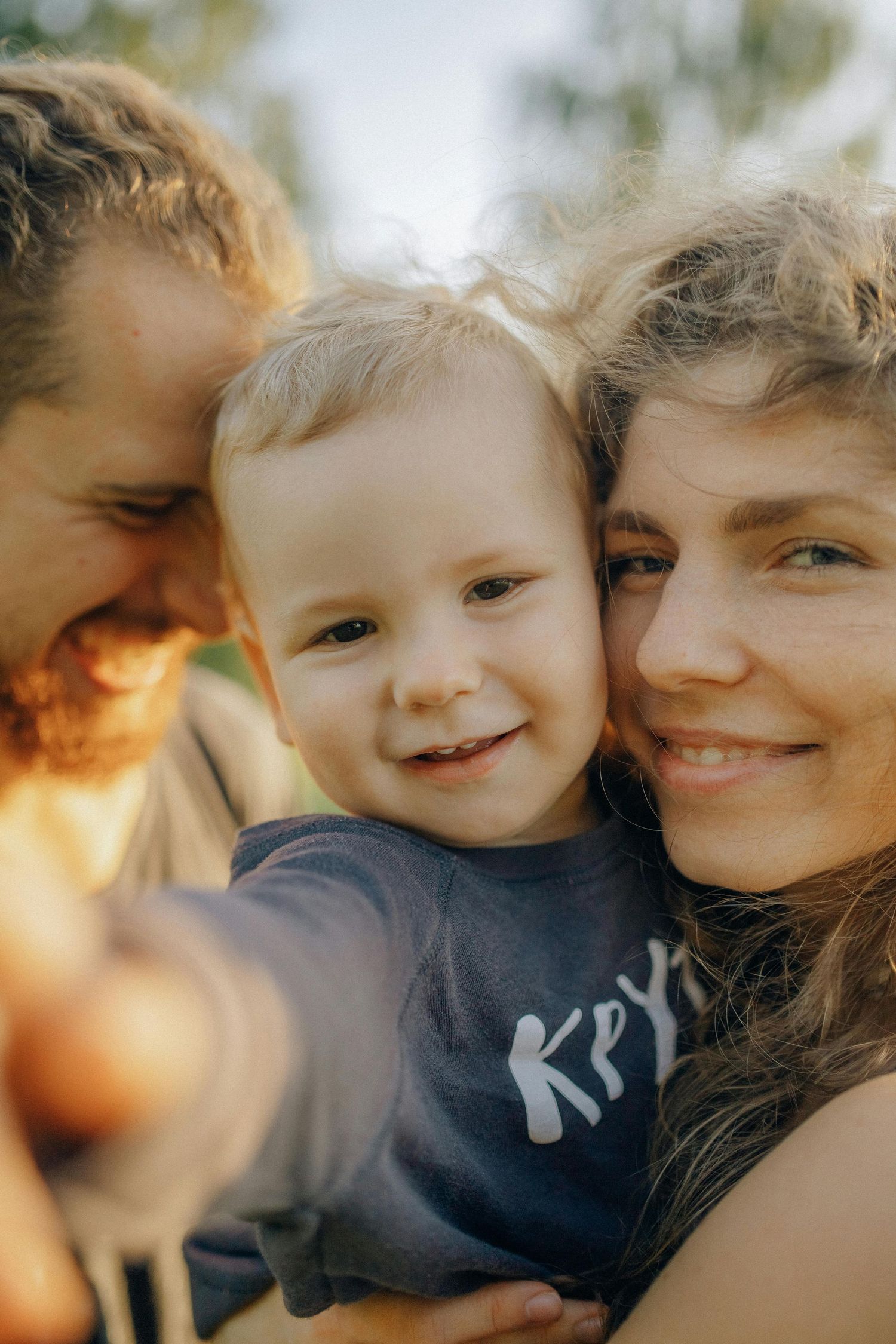 Paradise Valley Arizona Family Photography. A tender family moment captured in warm sunlight showing joyful expressions and closeness.