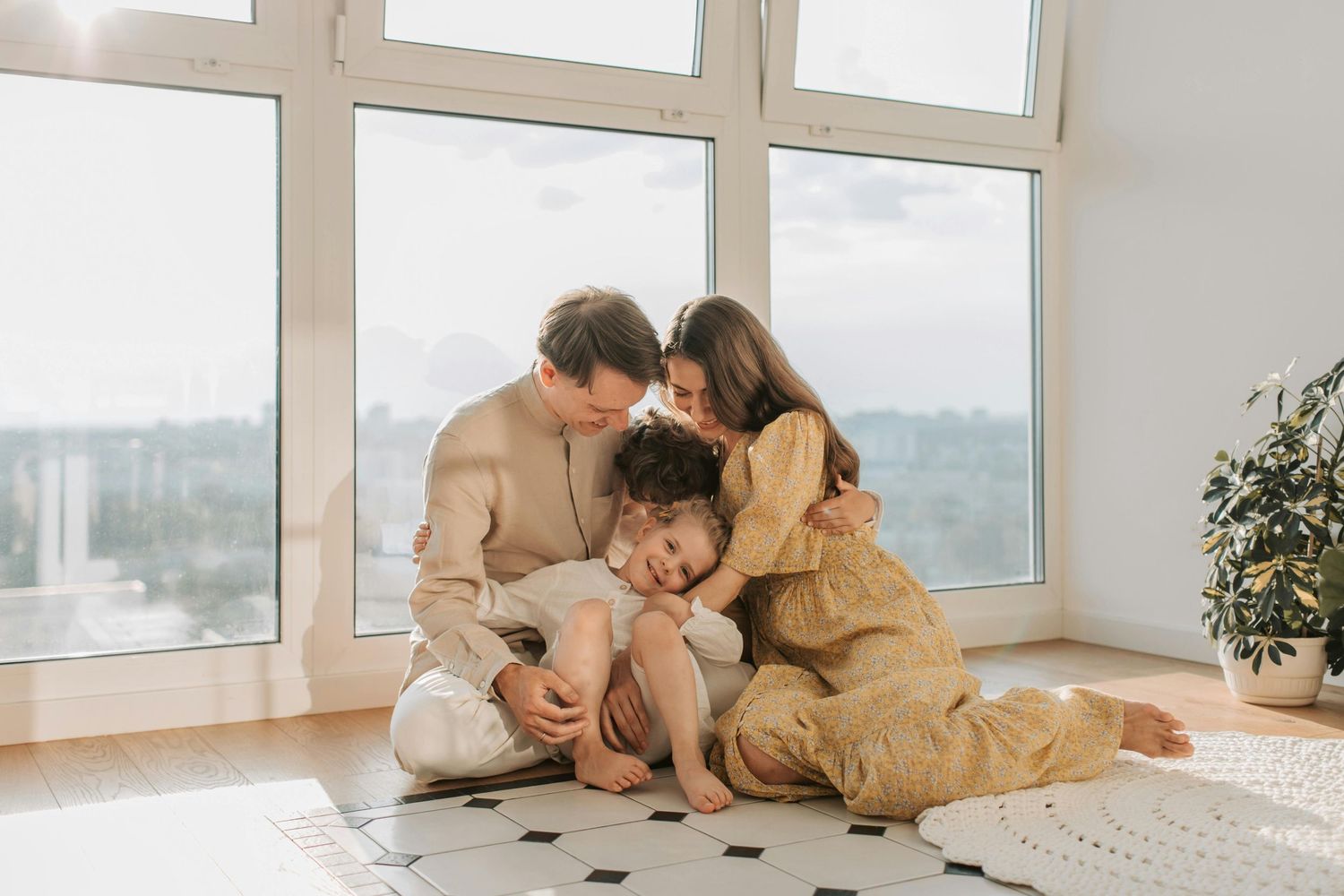 Gilbert joyful family portrait, bright studio tones, captured by luxury Arizona family photographer.