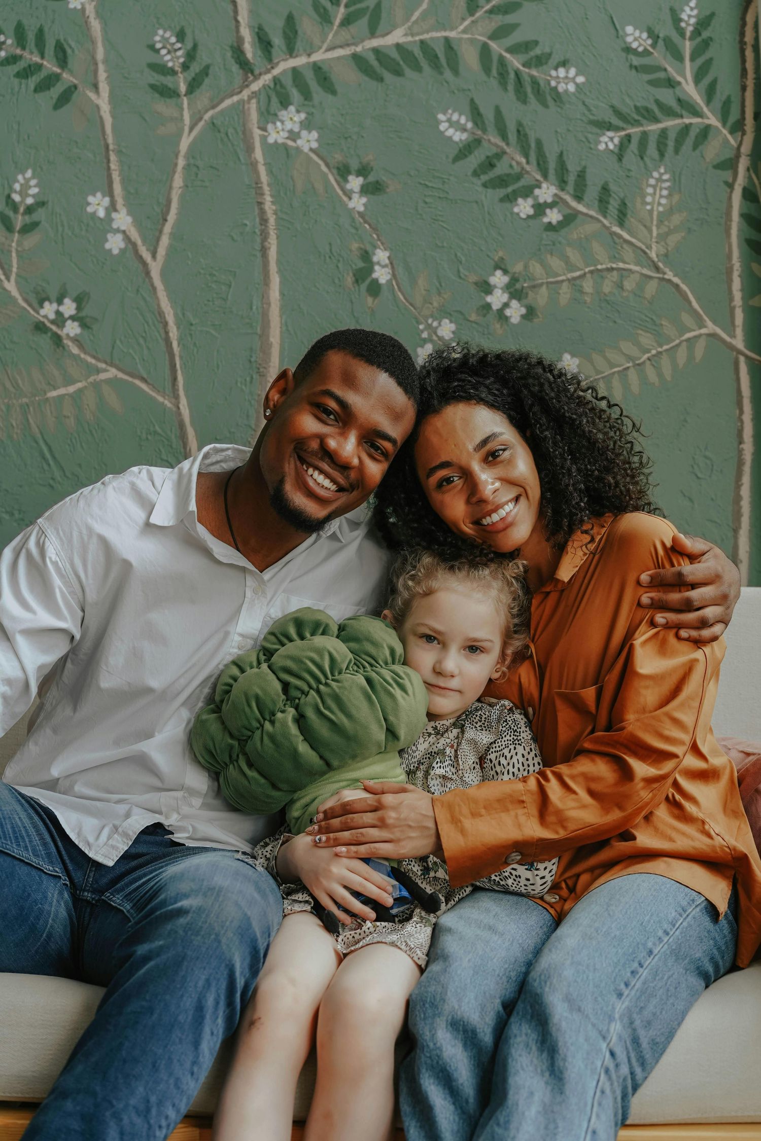 Holbrook at-home session, kids and parents laughing, warm tones, captured by Arizona family photographer.