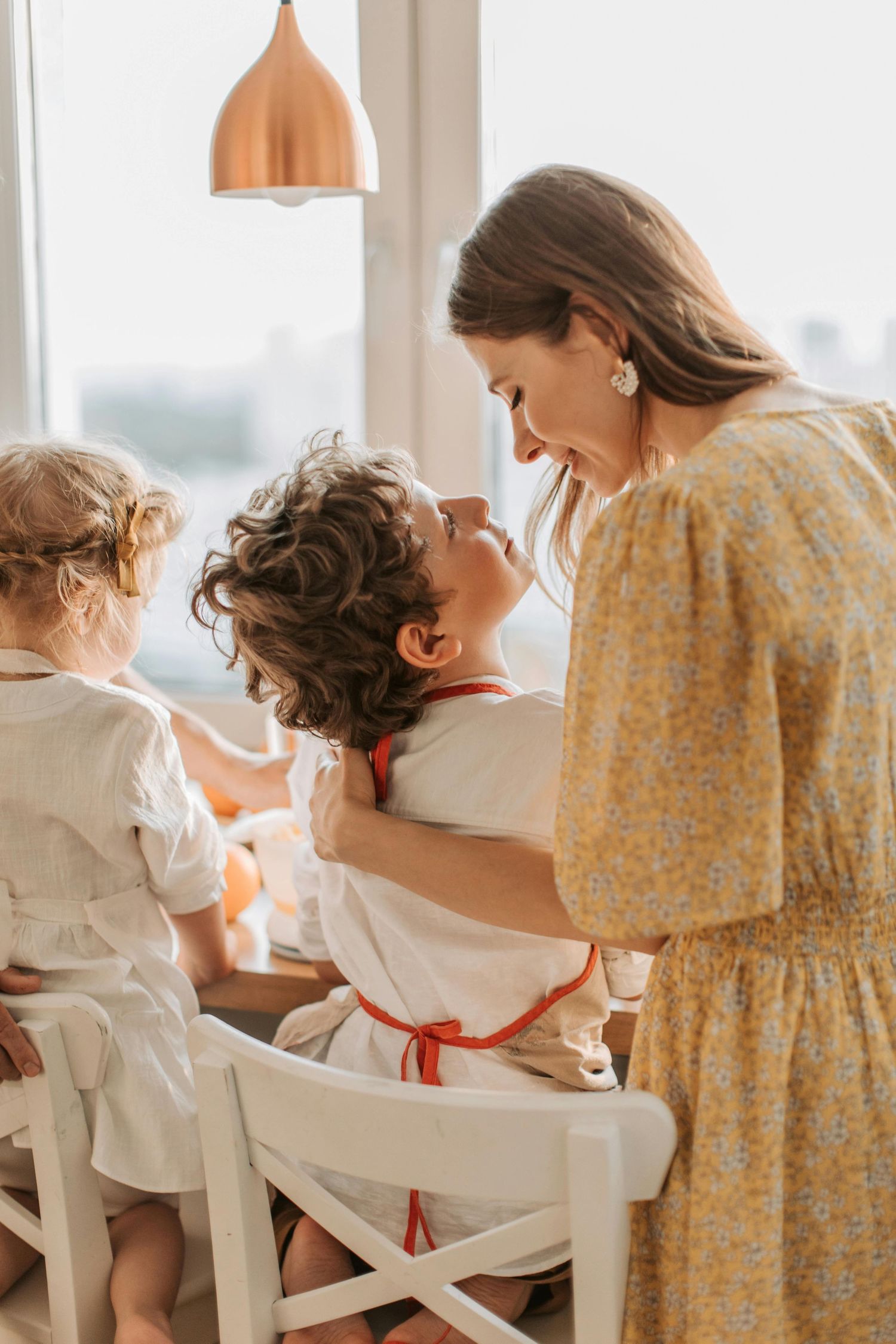 Maricopa studio portrait, playful family smiles, warm tones, photographed by luxury Arizona family photographer.