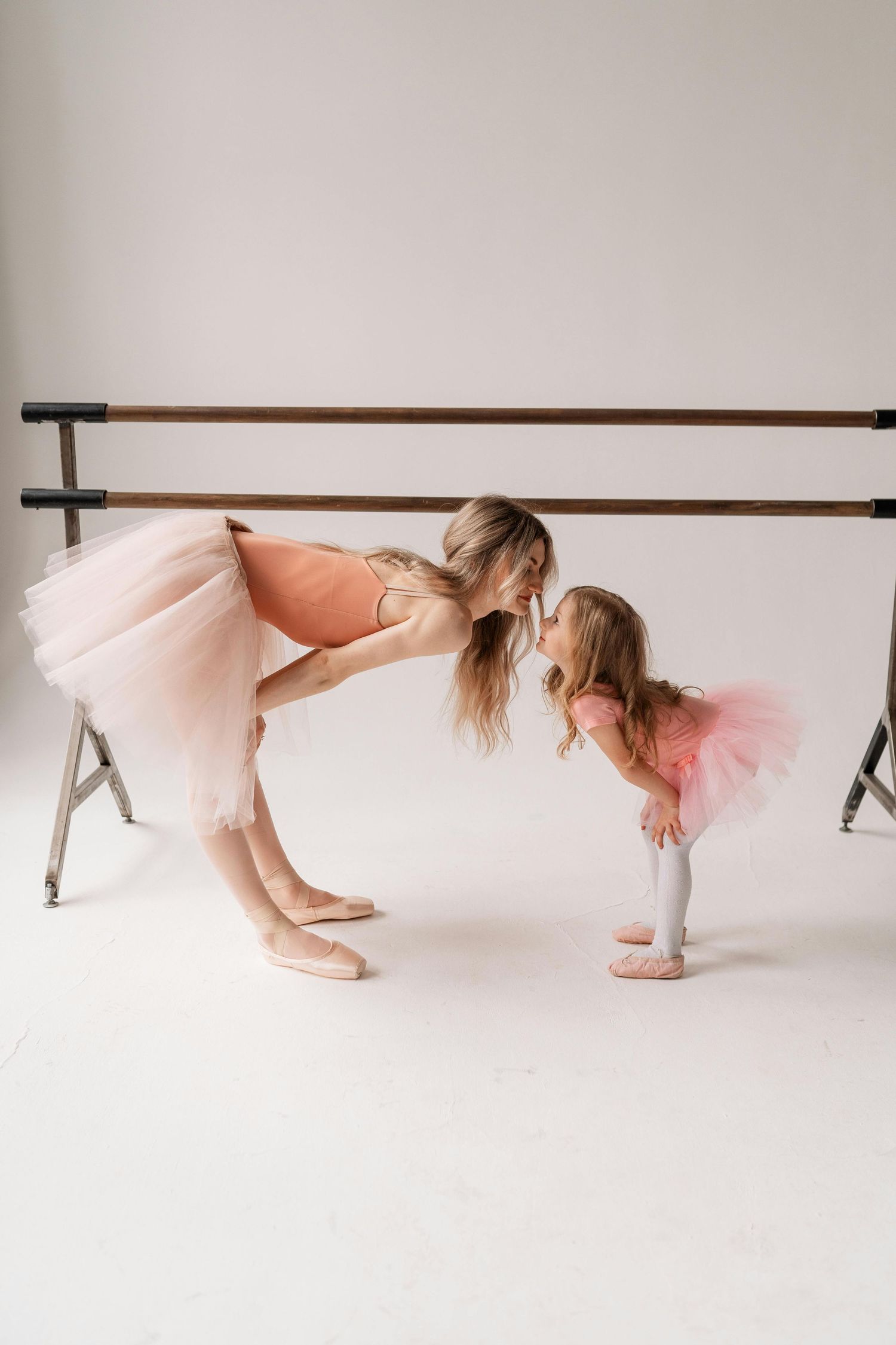 Scottsdale joyful studio session, mother and toddler, warm golden tones, photographed by top Arizona family photographer